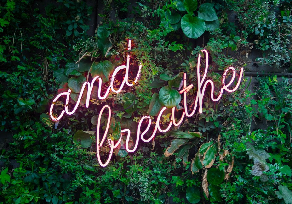 A Pink Neon sign That Reminds People to Breathe | Counseling Services
